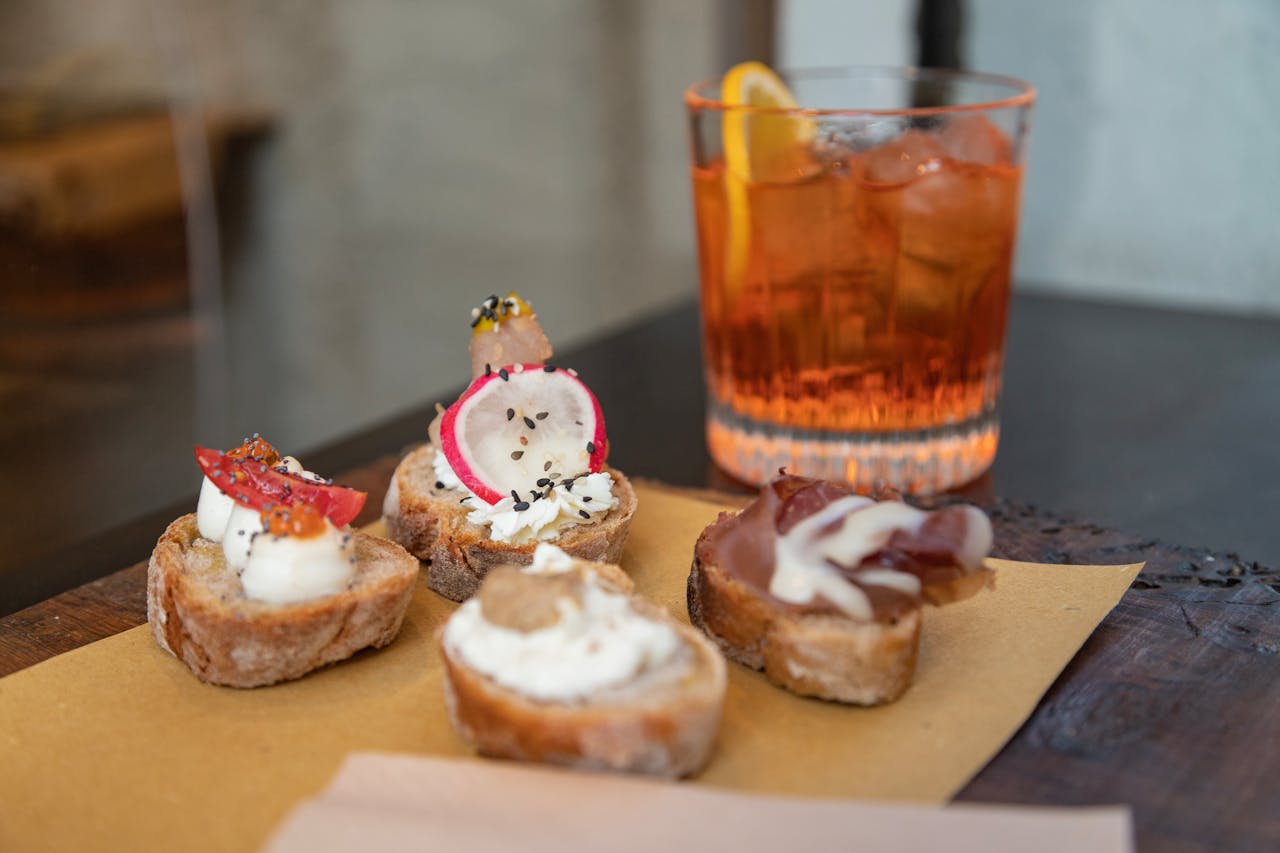 Delicious Italian crostini with a refreshing Aperol Spritz in Firenze, Italy.